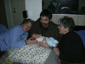 Xander with Aunt Julie, Uncle Chris, and Grandma