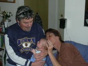 Aunt Lauren and Uncle Michael inspecting the newest family member.